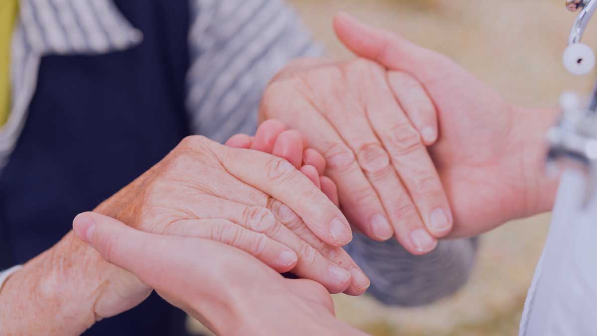 Doctors Helping Hands holding patient hands